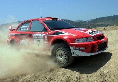 Tommi Mäkinen - Risto Mannisenmäki
48º Acropolis Rally 2001. Mitsubishi Lancer Evo 6.5 (W2 MMR). Clasificado 4º.
Marlboro Mitsubishi Ralliart

Del 14 al 17 de Junio, Atenas, Grecia.
Superficie: tierra.

El Rally tenia un total de 1613.98 km de los que 387.41 km divididos en 20 tramos eran especiales ((uno de ellos fue cancelado SS5 Elatia de 31.40 Km).

Tomaron la salida 110 equipos, finalizaron 47.@
Palabras clave: Tommi_Makinen;Acropolis;Grecia;Mitsubishi;Lancer;2001