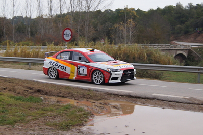 Josep Mª Membrado - Jordi Vilamala
54º Rallye 2000 Viratges 2014. Mitsubishi Lancer Evo X. Clasificado 1º.

El Rally tenia 88.26 Km cronometrados divididos en 10 tramos.
Tomaron la salida 99 equipos, 60 de ellos para el Campeonato de Catalunya Velocidad, 27 Regularidad y 12 de ECOseries.

Foto en B2 Vilaredes.
Palabras clave: 2000_Viratges;Manresa;Biela_Club_Manresa;2014