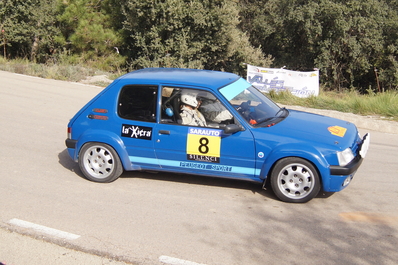 Juan Saguer - Nadezka RychKova
54º Rallye 2000 Viratges 2014. Peugeot 205 GTI 1.9.

El Rally tenia 88.26 Km cronometrados divididos en 10 tramos.
Tomaron la salida 99 equipos, 60 de ellos para el Campeonato de Catalunya Velocidad, 27 Regularidad y 12 de ECOseries.

Foto en A1 Taurons
Campeonato de Regularidad.
Palabras clave: 2000_Viratges;Manresa;Biela_Club_Manresa;2014
