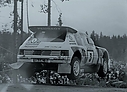 1985_001_003_Timo_Salonen_Rally_1000_Lakes_1985_T_Salonen_-_S_Harjanne_Peugeot_205_Turbo_16_E2_Winners.jpg