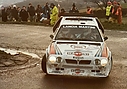 1985_001_006_Henri_Toivonen_Rally_Lombard_RAC_de_1985_Neil_Wilson_Lancia_Delta_S4_Fue_el_mas_rapido_en_esta_etapa_SS31_-_Oliver27s_Mount1.jpg