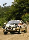 1986_999_Patrick_Tauziac_-_Claude_Papin2C_Mitsubishi_Starion_Turbo2C_retired.jpg