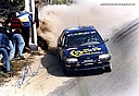 1993_007_004_Colin_McRae_Derek_Ringer_Subaru_Legacy_RS_Portugal_1993_7th_overall.jpg